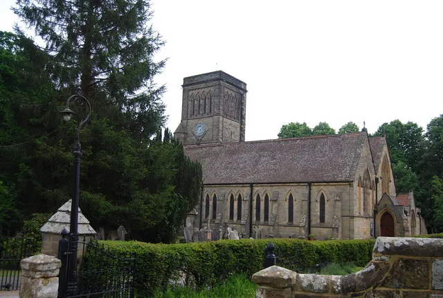St Paul's Church on Rusthall Common, framed by yew trees.