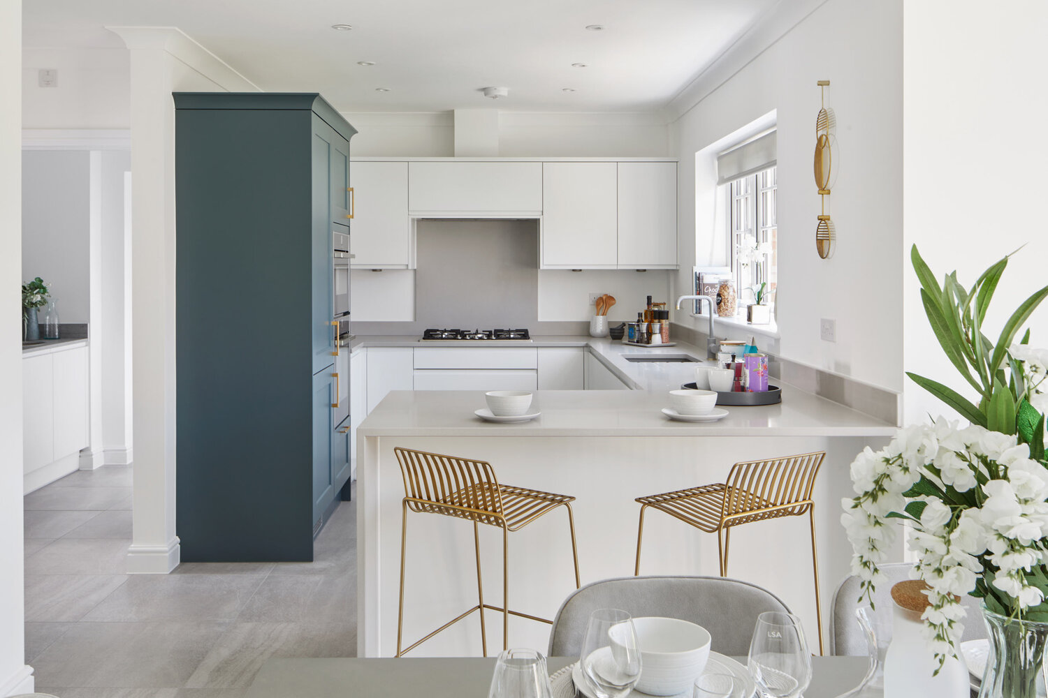A bright open-plan kitchen and dining room in a premium Tunbridge Wells home.